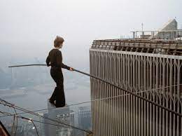 Philippe Petit’s World Trade Center high-wire stunt corssing a high wire over NY City